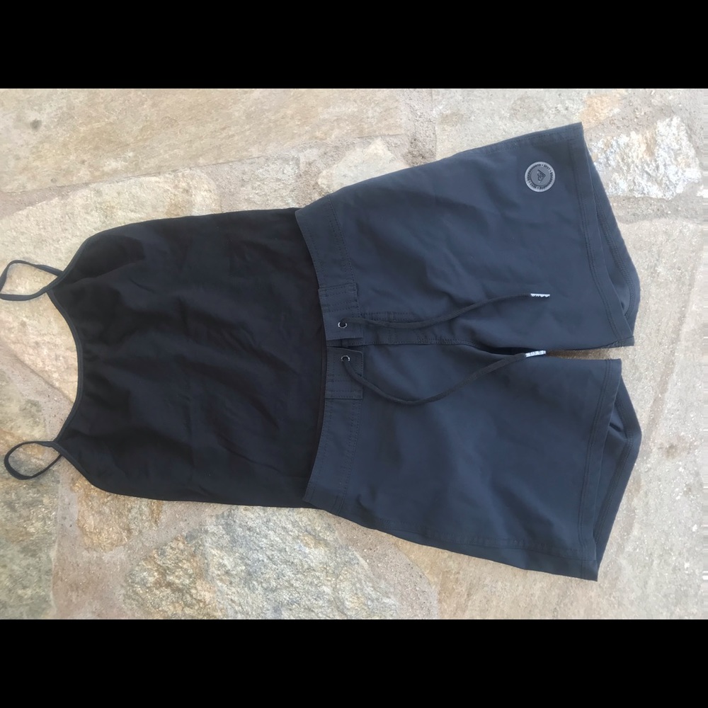 Cute swim shorts with a black tank top